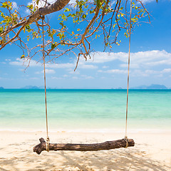 Image showing Swing on a tropical beach.