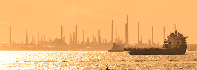 Image showing Tanker ships in front of refinery.