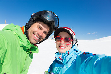 Image showing Couple skiing.