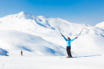 Image showing Excited woman skier.