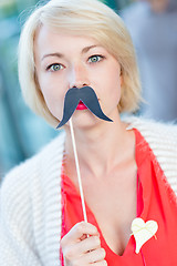 Image showing Woman with fake mustache.