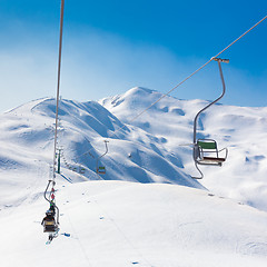 Image showing Skiers on ski lift at Vogel, Slovenia.