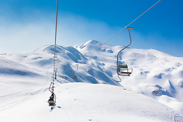 Image showing Skiers on ski lift at Vogel, Slovenia.