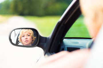 Image showing Lady driving a car.