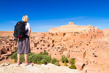 Image showing Traveler watching Ait Benhaddou, Morocco.