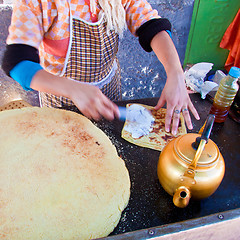 Image showing Baking traditional moroccan pancakes