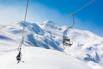 Image showing Skiers on ski lift at Vogel, Slovenia.