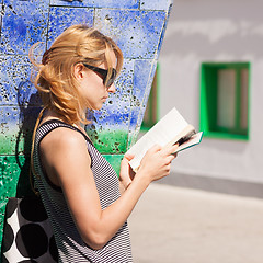 Image showing Woman reading a book.