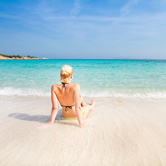 Image showing woman relaxing on the beach.
