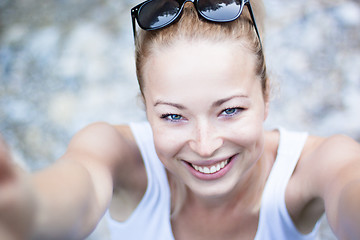 Image showing Portrait of a cheerful young woman.