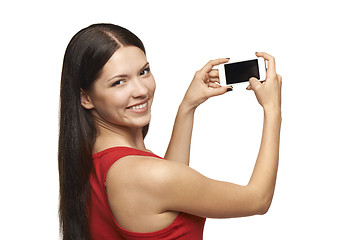 Image showing Woman taking pictures through cell phone