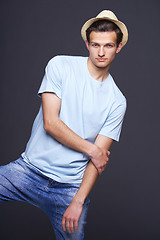 Image showing Handsome man in blank blue t-shirt and fedora hat