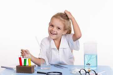 Image showing Joyful schoolgirl in chemistry class