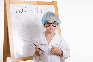 Image showing Chemist with a marker at the blackboard