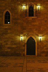 Image showing Front view of an stone house