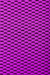 Image showing synthetic magenta cloth. grid closeup. macro