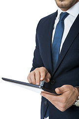 Image showing Businessman using a tablet computer