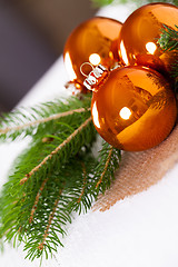 Image showing Shiny bright copper colored Christmas balls