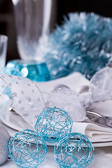Image showing Stylish blue and silver Christmas table setting