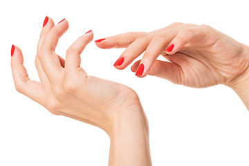 Image showing Woman with beautiful manicured red fingernails