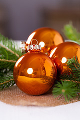 Image showing Shiny bright copper colored Christmas balls