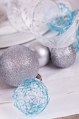 Image showing Stylish blue and silver Christmas table setting