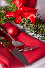 Image showing Red themed Christmas place setting