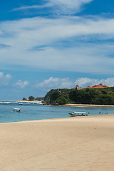 Image showing Beautiful tropical beach with lush vegetation