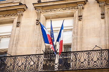 Image showing Flag of France fluttering under a serene blue sky