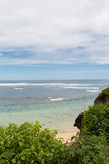 Image showing Beautiful tropical beach with lush vegetation