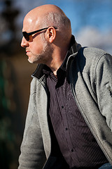 Image showing Stylish man in sunglasses enjoying the sun