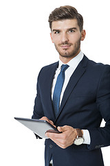 Image showing Businessman using a tablet computer