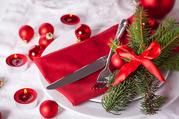 Image showing Red themed Christmas place setting