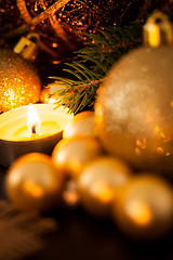 Image showing Warm gold and red Christmas candlelight background