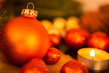 Image showing Warm gold and red Christmas candlelight background