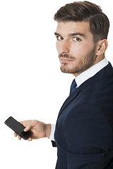 Image showing Stylish businessman chatting on his mobile