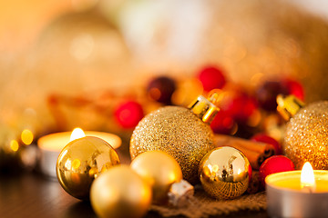 Image showing Warm gold and red Christmas candlelight background