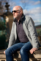 Image showing Stylish man in sunglasses enjoying the sun