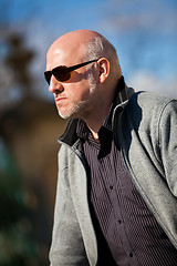 Image showing Stylish man in sunglasses enjoying the sun