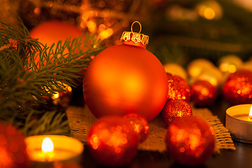 Image showing Warm gold and red Christmas candlelight background