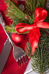 Image showing Red themed Christmas place setting