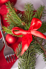 Image showing Red themed Christmas place setting