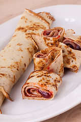 Image showing Sweet Rolled Pancakes on Plate