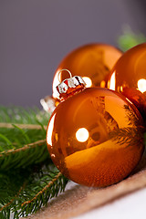 Image showing Shiny bright copper colored Christmas balls