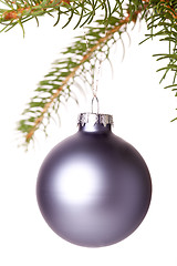 Image showing Christmas ball hanging from a branch of a fir tree