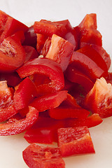 Image showing Pile of Chopped Red Pepper on Cutting Board