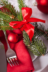 Image showing Red themed Christmas place setting