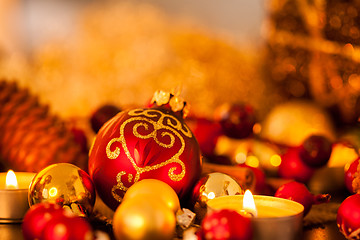 Image showing Warm gold and red Christmas candlelight background