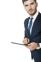 Image showing Businessman using a tablet computer