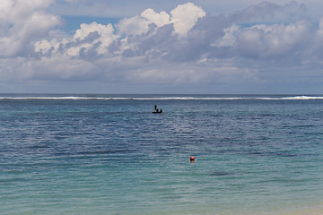 Image showing Beautiful tropical beach with lush vegetation